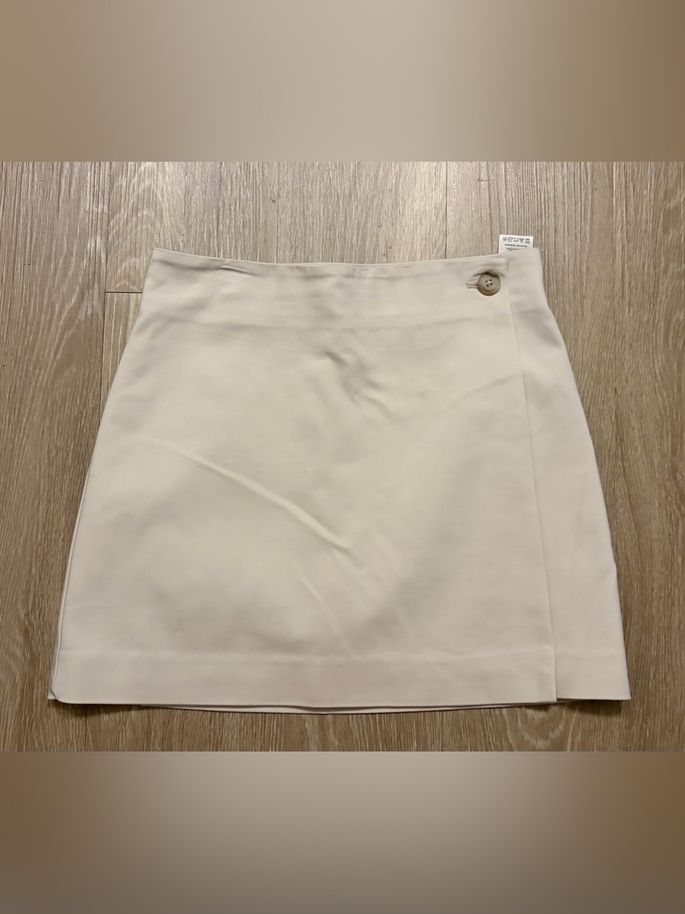 Cream Wrap-Front Mini Skirt with Single Button Detail